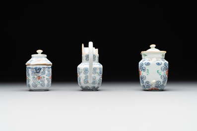 A Chinese blue, white and famille rose tea service, three famille rose bowls, a plate and a covered jar, 19th C.