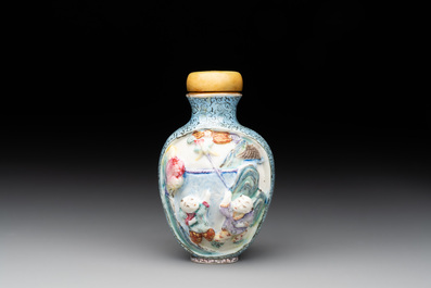 A Chinese moulded famille rose 'playing boys' snuff bottle, Qianlong mark, 19th C.