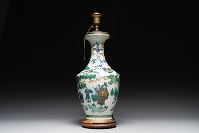 A Chinese famille verte vase, two famille rose jars and three covered jars, 19th C.