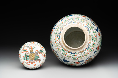 A Chinese famille verte 'figures and antiquities' jar and cover, Kangxi