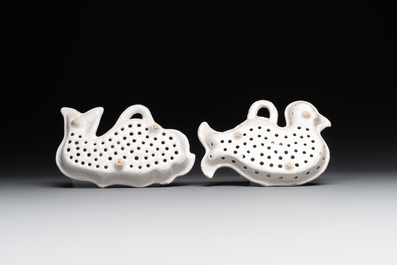 Two white-glazed pottery strainers in the shape of a dove and a whale, France, 18th C.