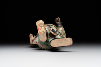 A fine Chinese verte biscuit figure of a warrior on wooden stand, Kangxi