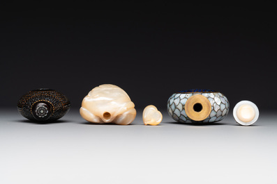 Two Chinese lacquered and mother-of-pearl-inlaid snuff bottles and a carved mother-of-pearl shell snuff bottle, Qianlong mark, 18/19th C