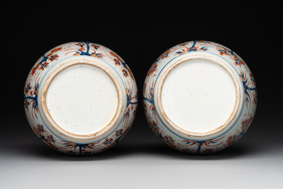 A pair of Chinese Imari-style 'grapevine' jars with wooden covers and stands, Kangxi