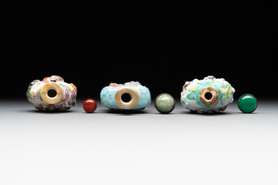 Six Chinese famille rose moulded snuff bottles, Qianlong mark, 19/20th C.