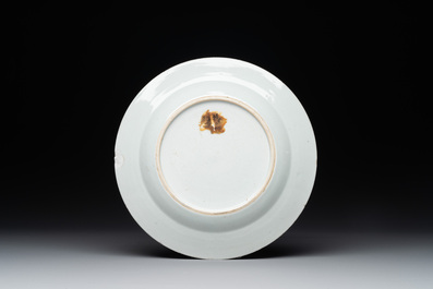 A Chinese rose-grisaille plate with Luohan, a dragon and a tiger, Yongzheng/Qianlong