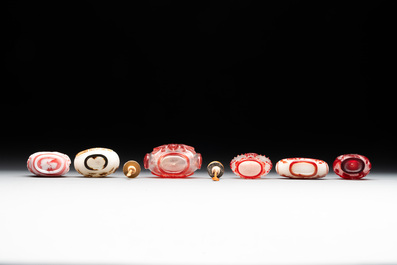 A group of six Chinese overlay glass snuff bottles, 19th C.