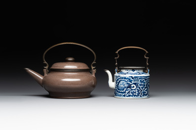 A Chinese polished purple Yixing stoneware covered teapot for the Thai market and a blue and white covered teapot, 19th C.