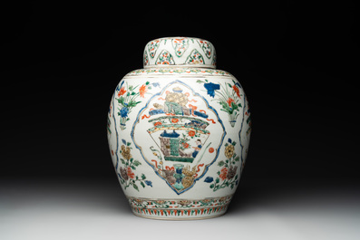 A Chinese famille verte 'figures and antiquities' jar and cover, Kangxi