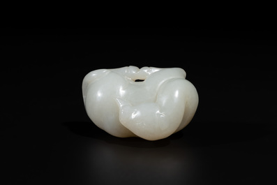A Chinese white jade carving of a reclining camel, Qing