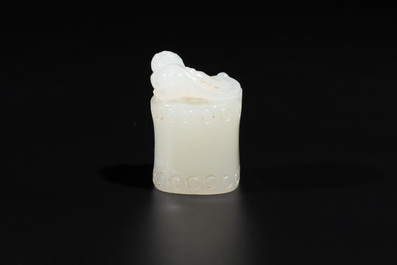 A Chinese white jade carving of a chilong reclining on bamboo, Qing