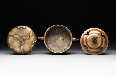 A Chinese bronze tripod censer with cover and stand, 19th C.