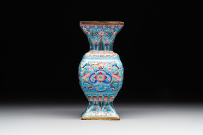 A Chinese Canton enamel 'gu' vase with floral design, Qianlong mark and of the period