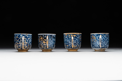 A Chinese Canton famille rose 18-piece 'mandarin subject' tea service, Qianlong
