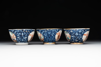 A Chinese Canton famille rose 18-piece 'mandarin subject' tea service, Qianlong