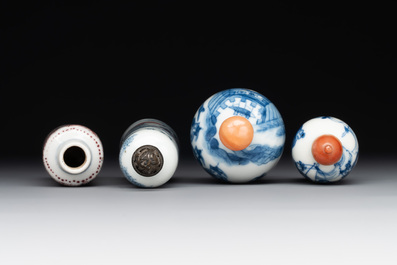 Two Chinese blue and white snuff bottles and two blue, white and copper-red snuff bottles, Yongzheng and Qianlong mark, 19th C.