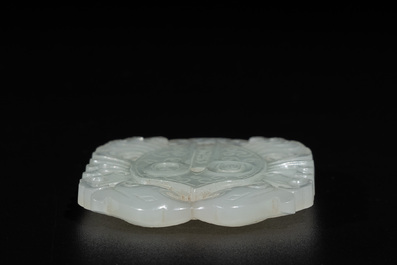 A Chinese white jade 'double phoenix' plaque, Qianlong mark and possibly of the period