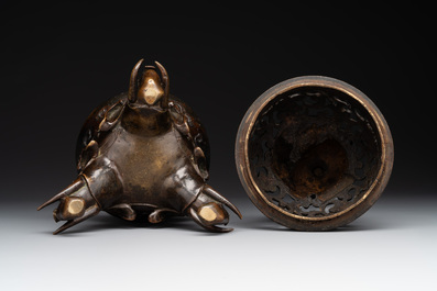 A fine Chinese tripod 'elephant' censer and cover, Ming