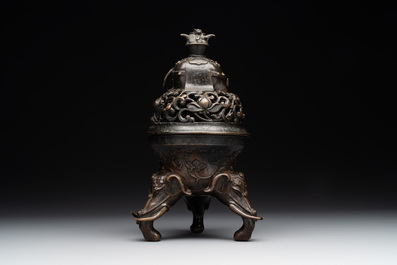A fine Chinese tripod 'elephant' censer and cover, Ming