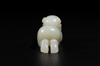 A Chinese white jade carving of a reclining boy, Qing