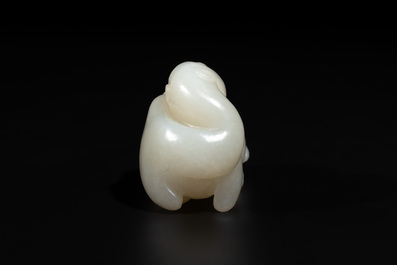 A Chinese white jade carving of a reclining camel, Qing
