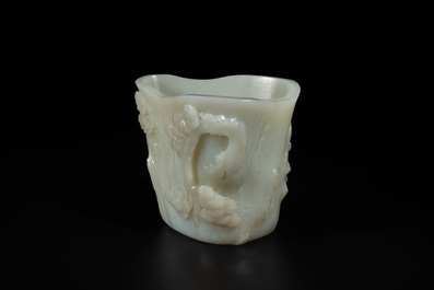 A Chinese white jade 'pine tree' brush pot, Qianlong