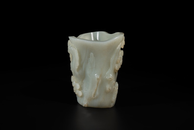 A Chinese white jade 'pine tree' brush pot, Qianlong