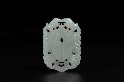 A Chinese white jade 'double phoenix' plaque, Qianlong mark and possibly of the period