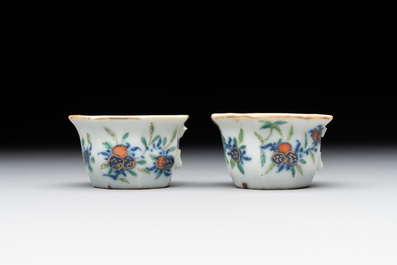 A Chinese blue, white and famille rose tea service, three famille rose bowls, a plate and a covered jar, 19th C.