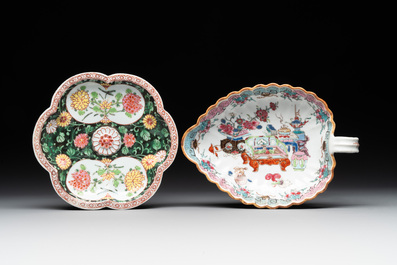 A Chinese famille rose black-ground teapot with cover and stand and a sauce boat, Qianlong