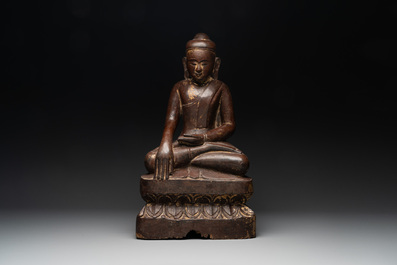 A Burmese lacquered and gilt wooden Buddha, 17/18th C.