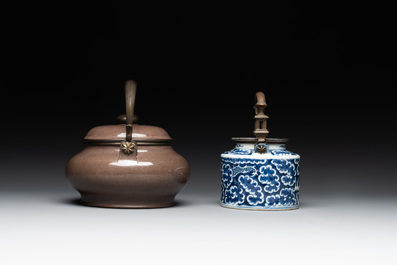 A Chinese polished purple Yixing stoneware covered teapot for the Thai market and a blue and white covered teapot, 19th C.