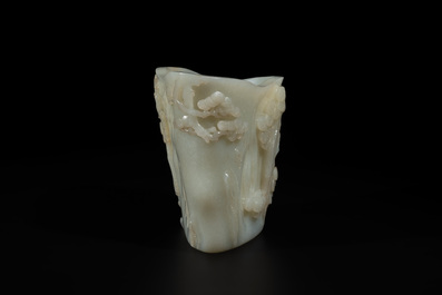 A Chinese white jade 'pine tree' brush pot, Qianlong