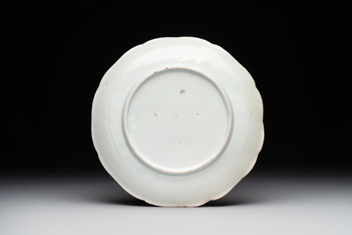 A Japanese Hizen ware Kakiemon-style 'riverside landscape' plate, Edo, 17/18th C.