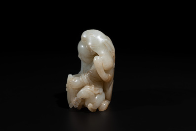 A Chinese white and russet jade 'Lu Ru Feng Qin 鹿乳奉親' carving, Qing