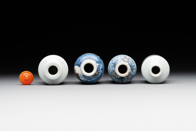 Four Chinese blue, white and copper-red snuff bottles, Yongzheng and Daoguang mark, 19th C.
