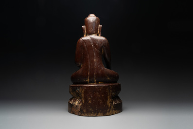 A Burmese lacquered and gilt wooden Buddha, 17/18th C.