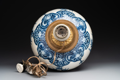 A Chinese blue and white 'dragon' vase, one jar mounted as lamp, two jars and a plate, Chenghua mark, 19th C.