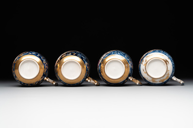 A Chinese Canton famille rose 18-piece 'mandarin subject' tea service, Qianlong