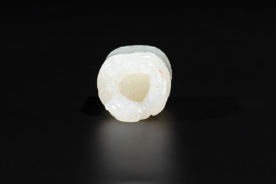 A Chinese white jade carving of a chilong reclining on bamboo, Qing