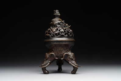 A fine Chinese tripod 'elephant' censer and cover, Ming