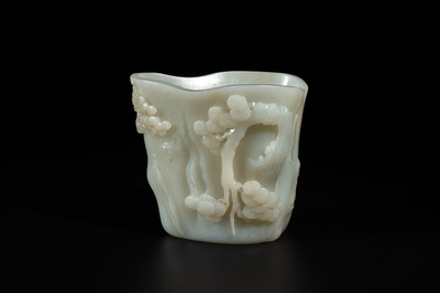 A Chinese white jade 'pine tree' brush pot, Qianlong
