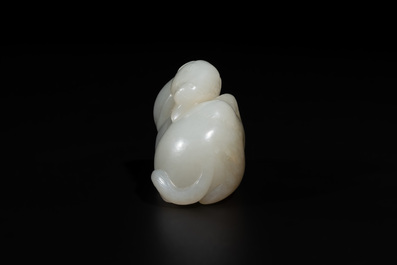 A Chinese white jade carving of a reclining camel, Qing