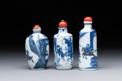 Two Chinese blue and white snuff bottles and a blue, white and copper-red snuff bottle, Yongzheng mark, 19th C.