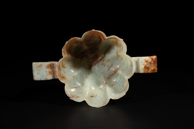 A Chinese celadon and russet jade wedding cup, 18th C.