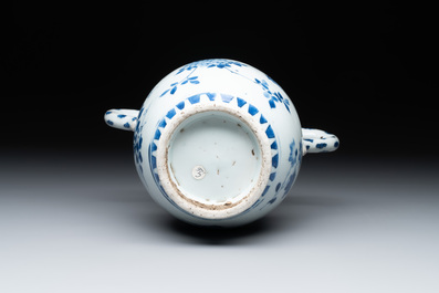 A Chinese blue and white vase with floral design and two handles, Transitional period
