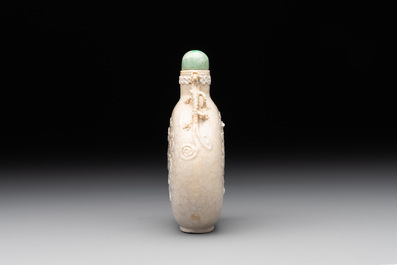 A rare Chinese monochrome ge-type 'chilong' snuff bottle with jadeite stopper, Qianlong mark and of the period