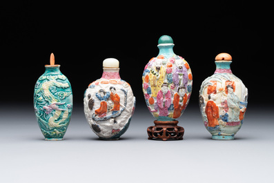 Eight Chinese moulded famille rose snuff bottles, Qianlong mark, 19th C.