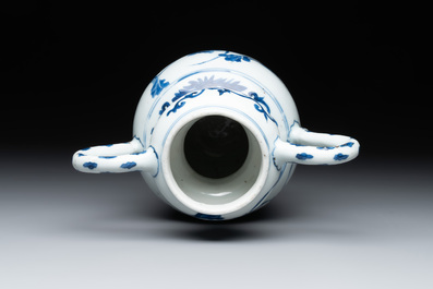 A Chinese blue and white vase with floral design and two handles, Transitional period