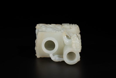 A Chinese white jade 'dragon' ink container with Qianlong mark and possibly of the period